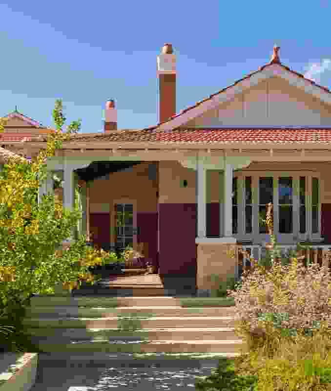 A large verandah is a shaded spot for surveying the street-facing garden.