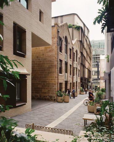 The backbone of the development, Loftus Lane, provides a human-scale refuge, unlike the open space of the neighboring Quay lobby.