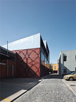  View east along the rear laneway. Patterned brickwork has been used for the exterior wall. Image: Peter Bennetts. 