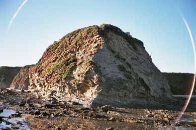 A windswept coastal headland in Inverloch, Victoria – both a concrete entity and a setting for personal transformation.