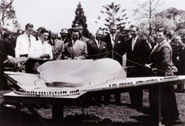 The architects of the Sidney Myer Music Bowl with a model of the proposal, 1958. Barry Patten is on the far right, looking at the camera.