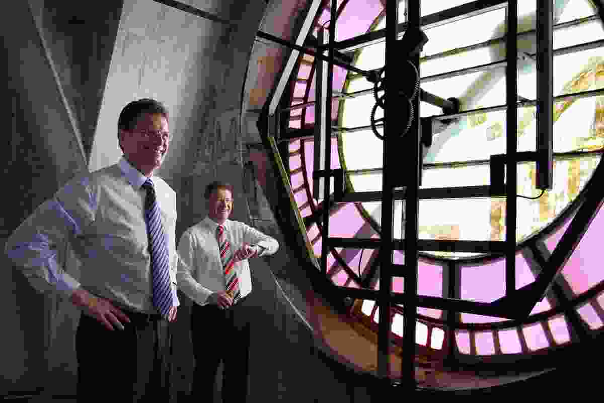 Premier Ted Baillieu and the minister for major projects, Denis Napthine, consider the interior of the clock.