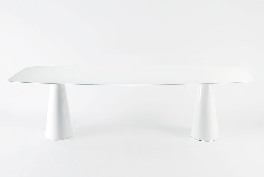 The Oui table for Kartell has elegant cone-shaped legs and is available in full colour or metallic versions.