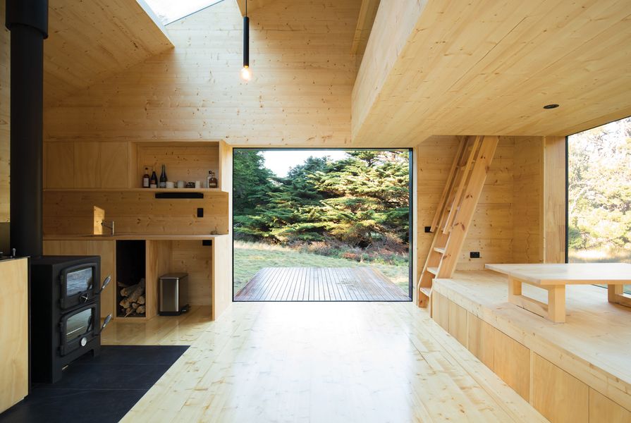 The open-plan cabin interior is designed without any loose furniture that might clutter the solitude.