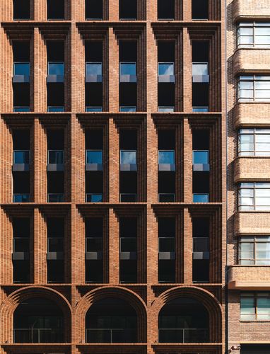 Tall towers amid brick warehouses: Arc | ArchitectureAu