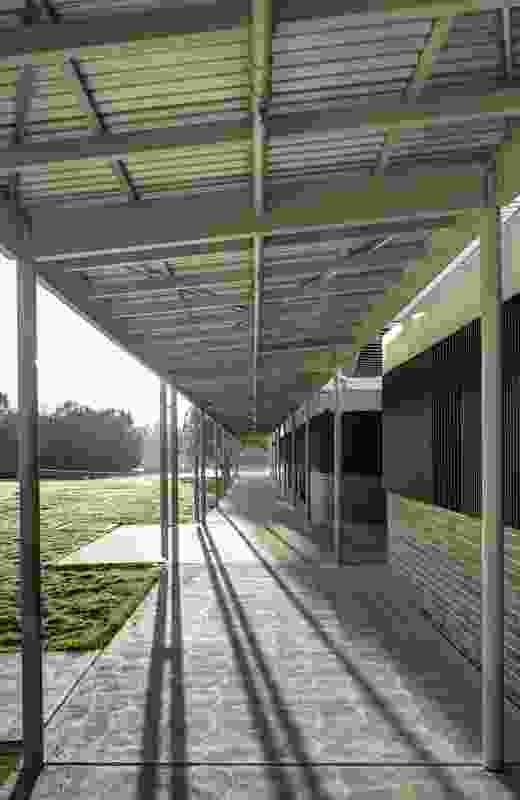 A covered verandah at Woodcroft Neighbourhood Centre by Carter Williamson Architects connects the street and the lakefront.