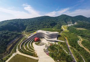 The museum building, designed by architects Studio Odile Decq, is nestled into the contours of the heavily quarried hillside.