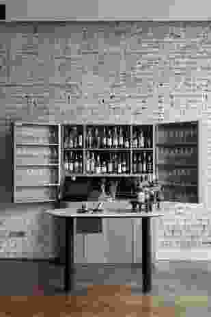 A champagne bar greets guests in the front bar.