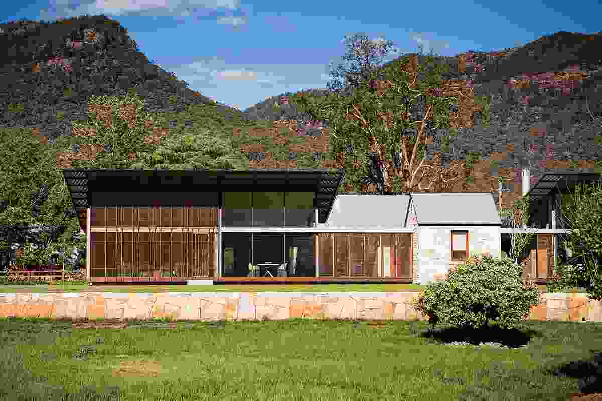 House in Country NSW (2010): Built around a former bushranger’s cottage, its steel roofs lifting up to frame the tops of the surrounding mountains.