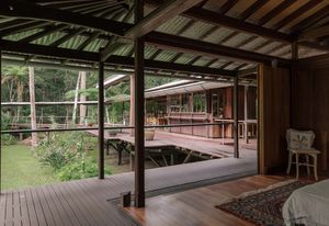 Operable panels slide open to support a sensory experience of the landscape.