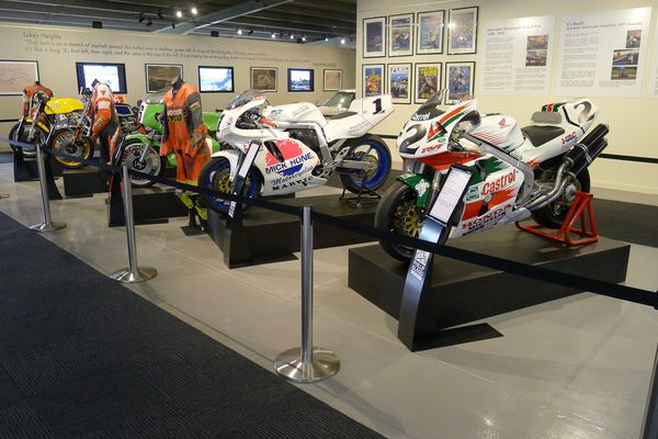The collection of historic Grand Prix motor bikes is mounted on a series of flexible Drama Boxes, which can be rearranged to suit display requirements.