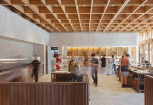 Trinity College dining hall expansion designed by Hayball, with acoustic consulting by Arup.