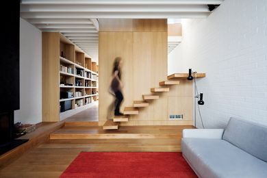 The lounge room features a stair with no balustrade.