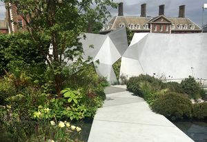 The Jeremy Vine Texture Garden by Matt Keightley with its geometric concrete forms in views framed by dwarf Pinus mugo.