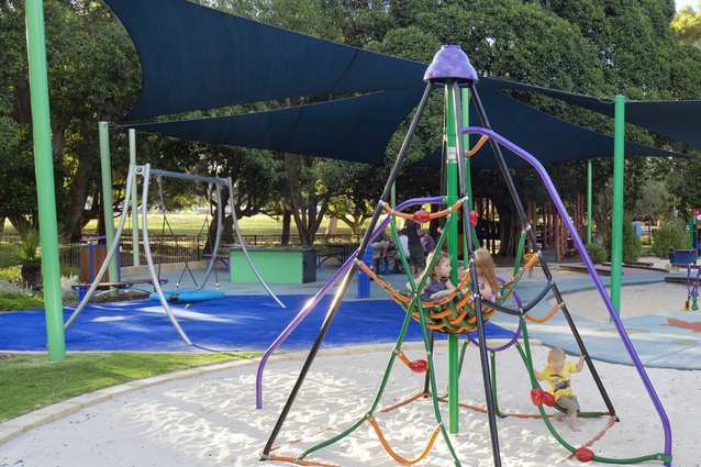 Children ‘hang out’ on the climbing frame.