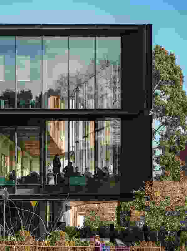 A reading space on the first floor of the north-west corner features extensive glazing, providing views to mature trees in St Michael’s Green.