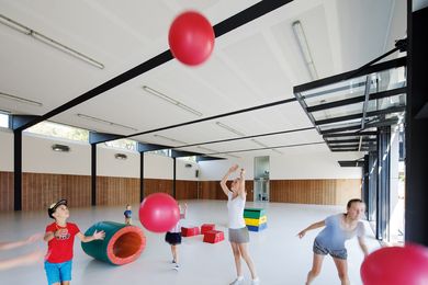 A large, flexible space beneath the new classrooms.