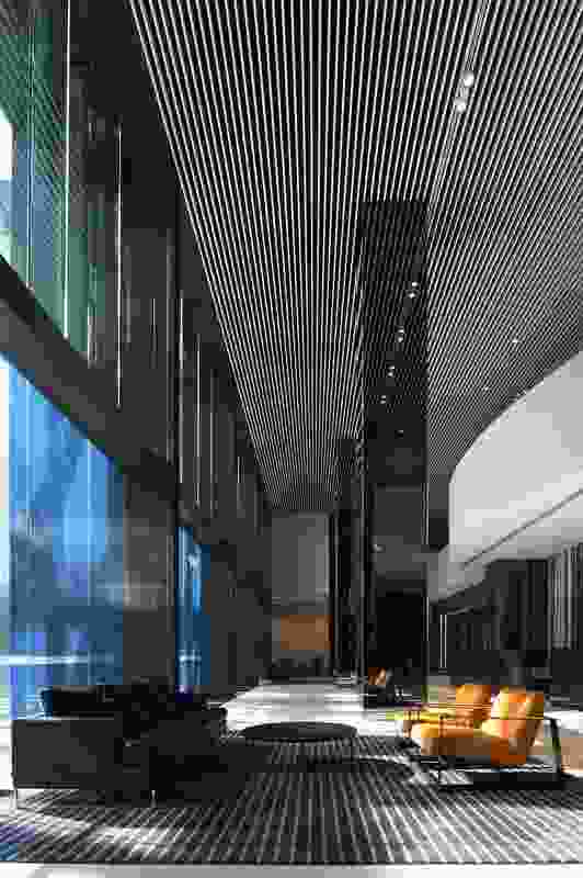 The foyer speaks more of a slick urban resort than dowdy business headquarters.