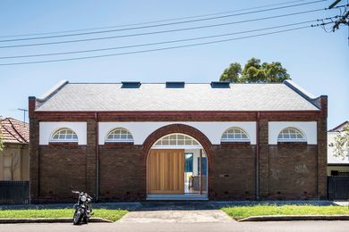 The original drill hall, built between 1904 and 1906, has been imaginatively restored and recast as a sophisticated three-storey home.