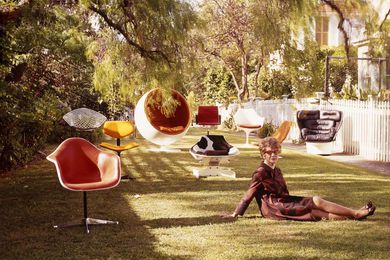 Marion Best with nine chairs designed by Andrews, Aarnio, Saarinen, Colombo, Charles and Ray Eames, and Bertoia at The Grove, Woollahra.