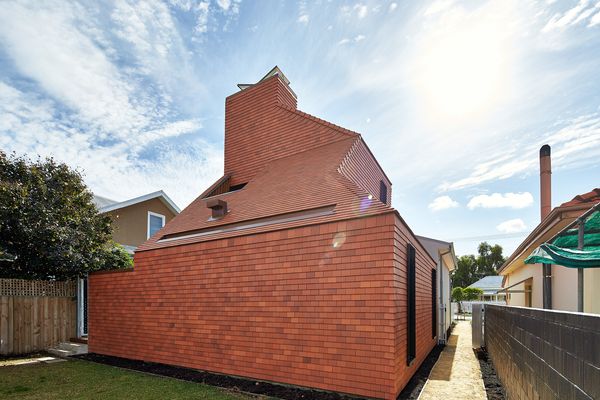 Designed in the manner of an oast, the extension is a reference to the industrious local migrant community.