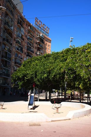 At Flores & Prats' Plaza Pio XII, the leafy pergola creates an open-air vestibule to the apartment building.