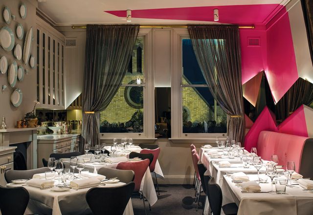 The upstairs dining room retains its opulence and gains a graphic signature.