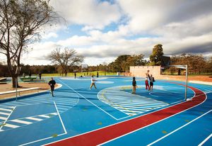 The graphic surface of the multipurpose area allows for a variety of sports and activities to occur simultaneously.