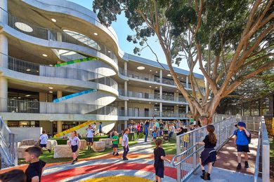 Bellevue Hill Public School by Group GSA is provided as an example in the manual for its use of of an existing large tree to provide shading to the play area.