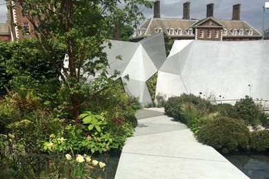 The Jeremy Vine Texture Garden by Matt Keightley with its geometric concrete forms in views framed by dwarf Pinus mugo.