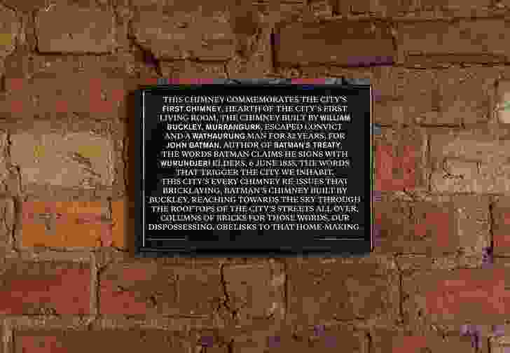 An example of the A4-size offset-printed paper plaques that were handed out as part of Unfinished monument to Batman’s Treaty.