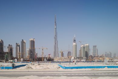 Highrise construction in Dubai, UAE, where much of the architecture is designed from afar, with little connection to the nuances of place. Juhani Pallasmaa describes it as “almost irresponsible to design buildings in alien cultures.”
