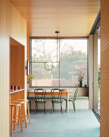 Victorian ash lining boards used throughout the addition bring a sense of intimacy to the kitchen space.