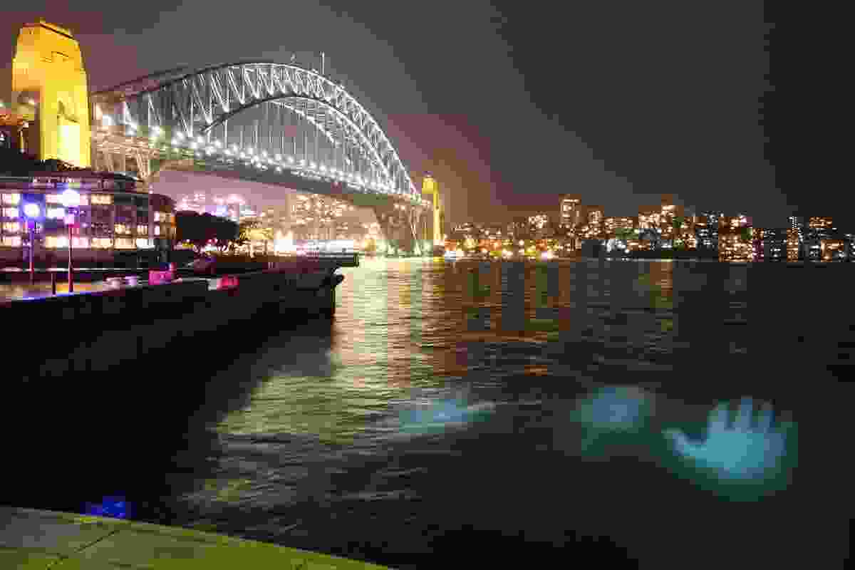 The Buchan Group's light sculpture at the Vivid Sydney festival includes eerie images of a man under the water.
