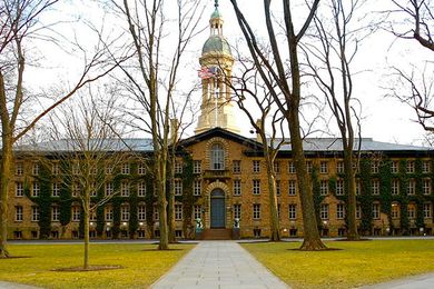 Nassau Hall, the original building and current administration building of Princeton University. by Smallbones, cropped by Inabluemn, licensed under  CCO 1.0a